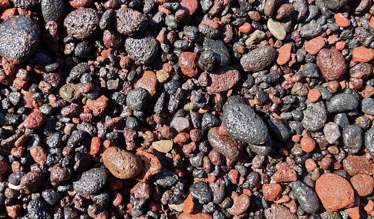 Red and black pebbles of Santorini